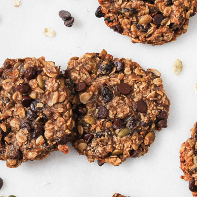 PACKD healthy banana oat cookies laid out on a table