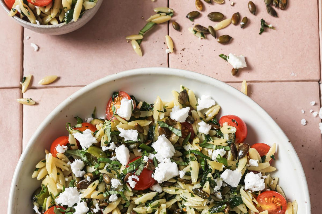 PACK'D Lemony Spinach Orzo Salad served in a large bowl