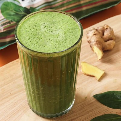 Glass mug filled with "The Gentle Cleanse" PACKD smoothie.