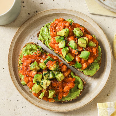 PACKD bake beans and avocado on toast in a bowl