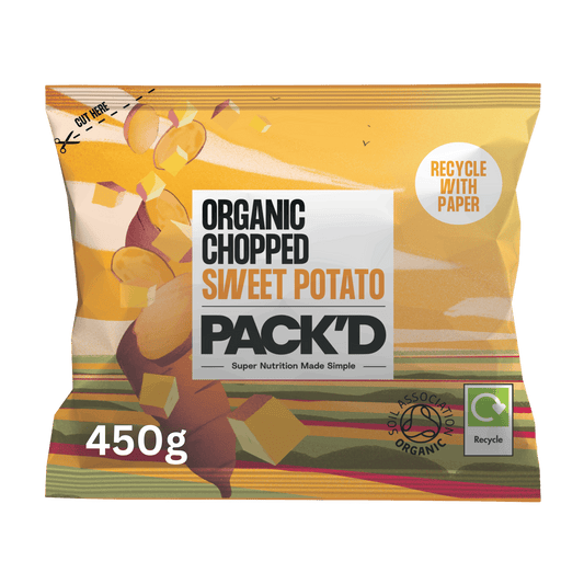 A 450g bag of Pack'd Organic Chopped Sweet Potato chips, featuring a bright yellow-orange wrapper with illustrations of sliced potatoes and product details on a white background.