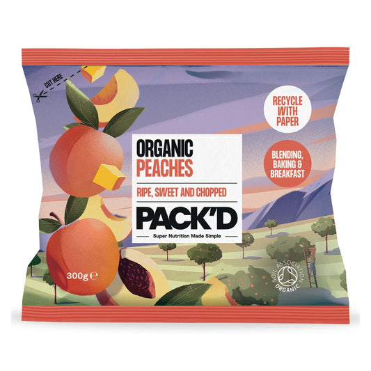 A 300g bag of Pack'd Organic Peaches Ripe, Sweet and Chopped, featuring a colorful illustration of peaches, leaves, and a stylized landscape on the packaging.